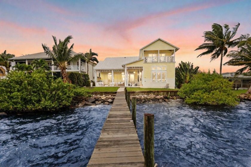 Experience luxury living with this WIDE waterfront estate with - Beach Home for sale in Palm City, Florida on Beachhouse.com