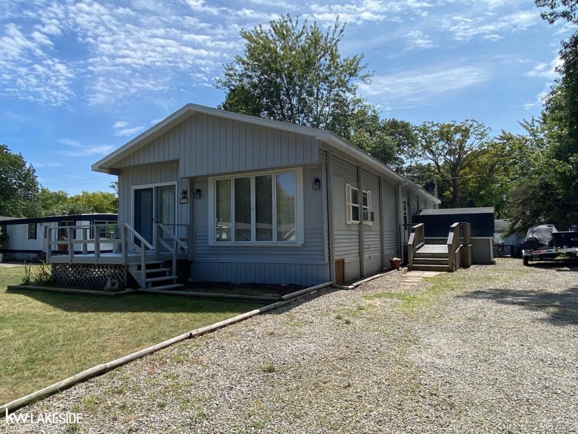 This very well-maintained two-bedroom, one-bath home is move-in - Beach Home for sale in Caseville, Michigan on Beachhouse.com