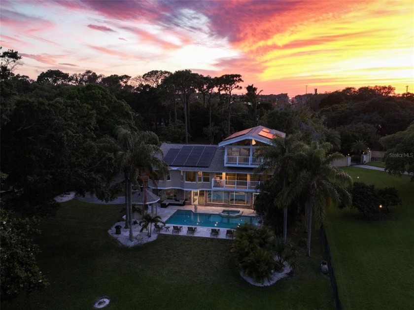 A truly exceptional waterfront estate awaits you on the gentle - Beach Home for sale in Tarpon Springs, Florida on Beachhouse.com