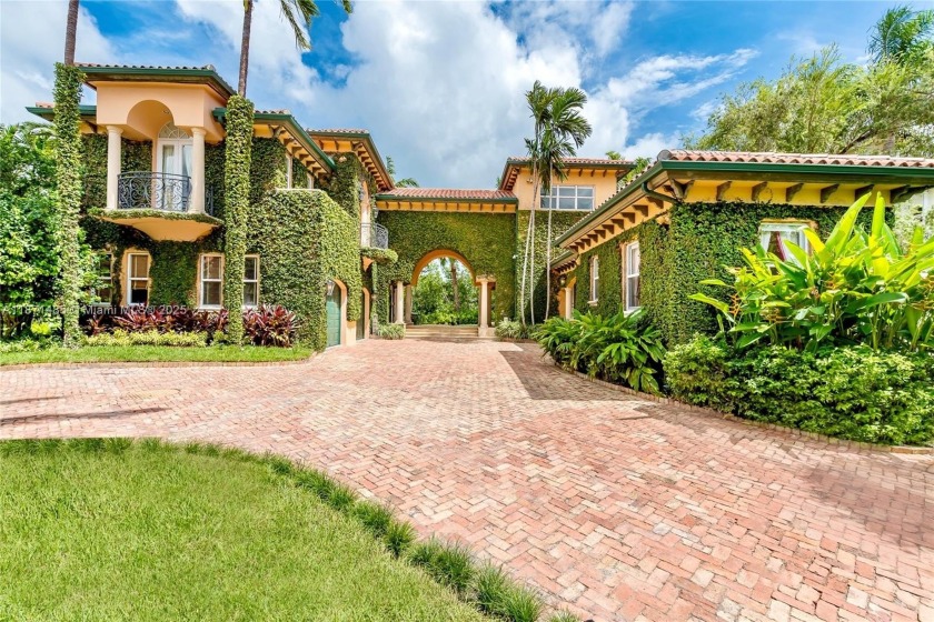 Nestled in the exclusive Islands of Cocoplum community, this - Beach Home for sale in Coral Gables, Florida on Beachhouse.com