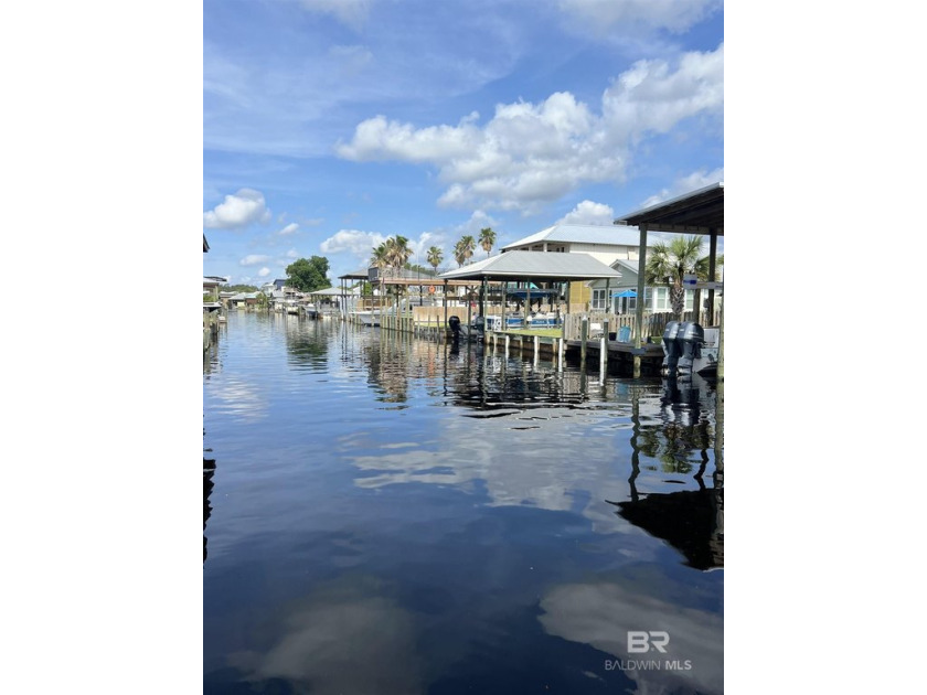 Build your waterfront dream home on this deepwater canal lot - Beach Lot for sale in Orange Beach, Alabama on Beachhouse.com