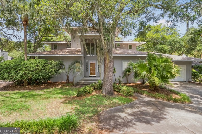 Character and coastal charm come together in this beautiful 3 - Beach Home for sale in Saint Simons, Georgia on Beachhouse.com