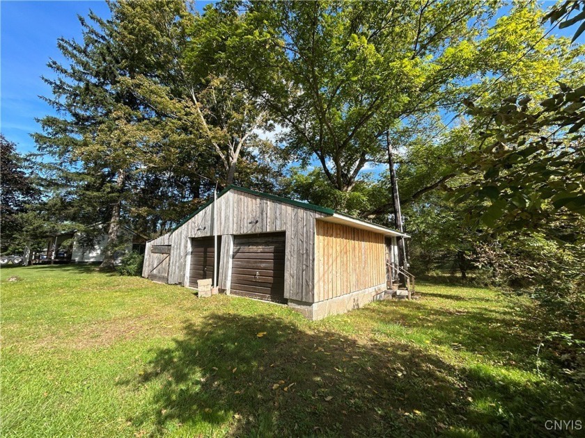 Don't be deceived by the charming two-car garage in - Beach Lot for sale in Sterling, New York on Beachhouse.com