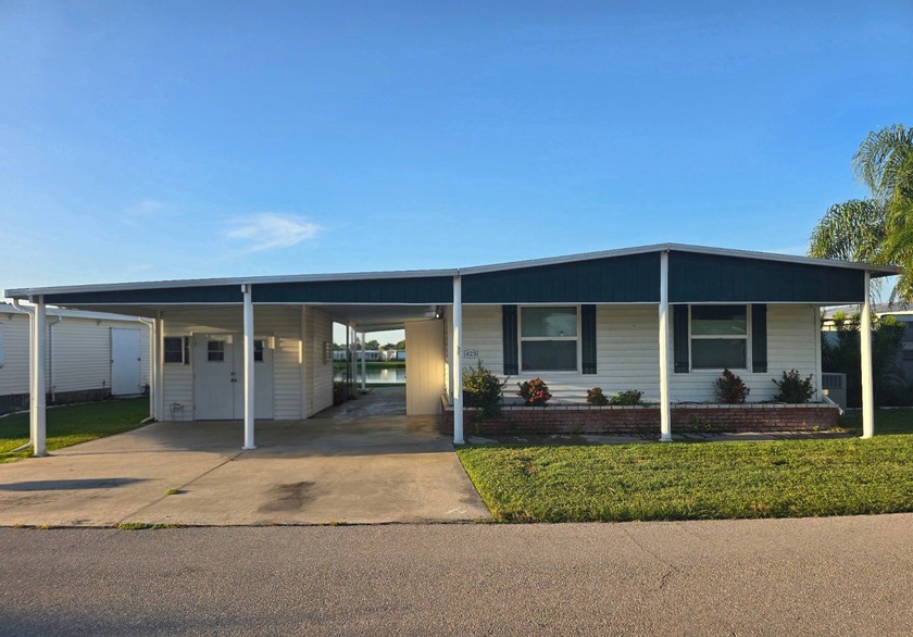 Your Florida dream life begins with sunset water views-yours to - Beach Home for sale in North Fort Myers, Florida on Beachhouse.com