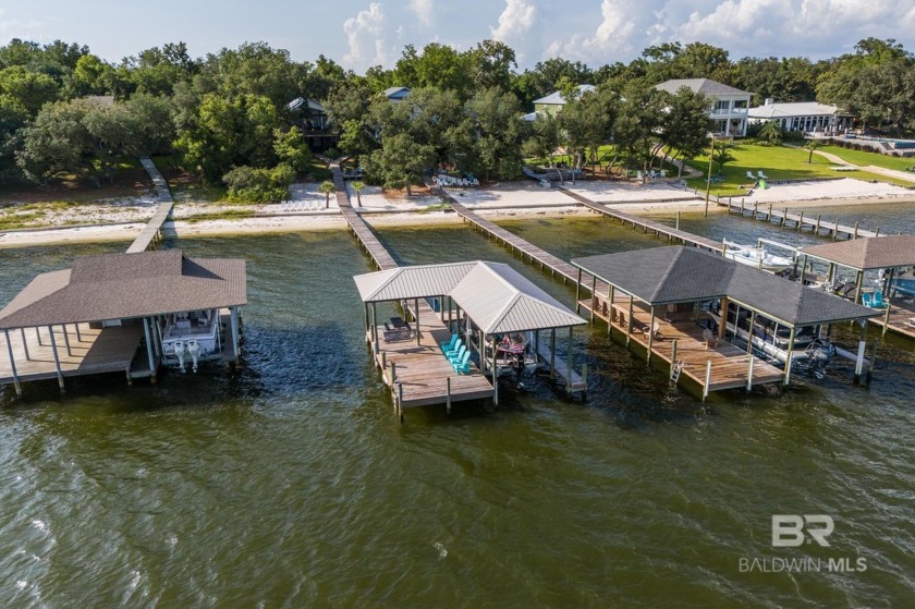 Welcome to your waterfront oasis in Orange Beach, AL!  Nestled - Beach Home for sale in Orange Beach, Alabama on Beachhouse.com