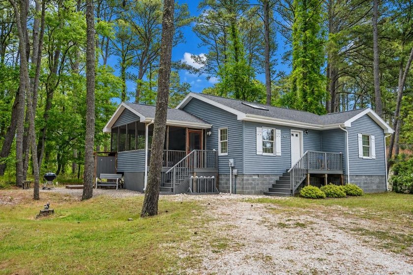 Tucked away on the peaceful left side of Oak Drive, where the - Beach Home for sale in Chincoteague Island, Virginia on Beachhouse.com