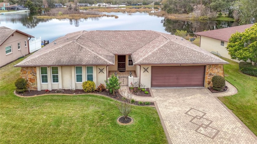 This amazing lakefront 3-Bedroom, 2-Bathroom home awaits you! - Beach Home for sale in Hudson, Florida on Beachhouse.com