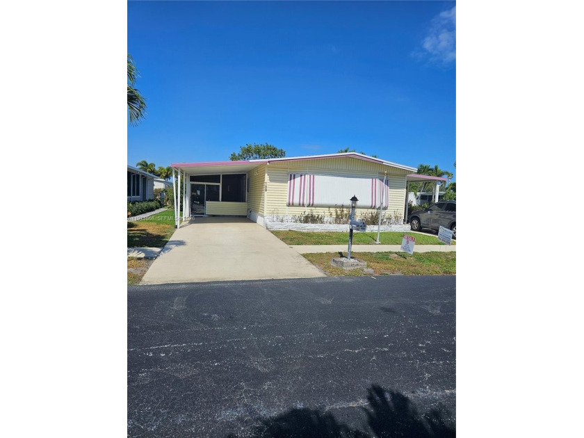Impressive Corner-Lot Residence in Highland Meadows Estates East - Beach Home for sale in Deerfield Beach, Florida on Beachhouse.com
