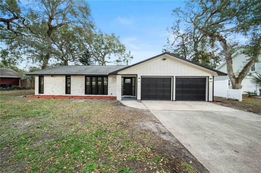 Welcome to this beautifully updated home in the sought-after Oak - Beach Home for sale in Ormond Beach, Florida on Beachhouse.com