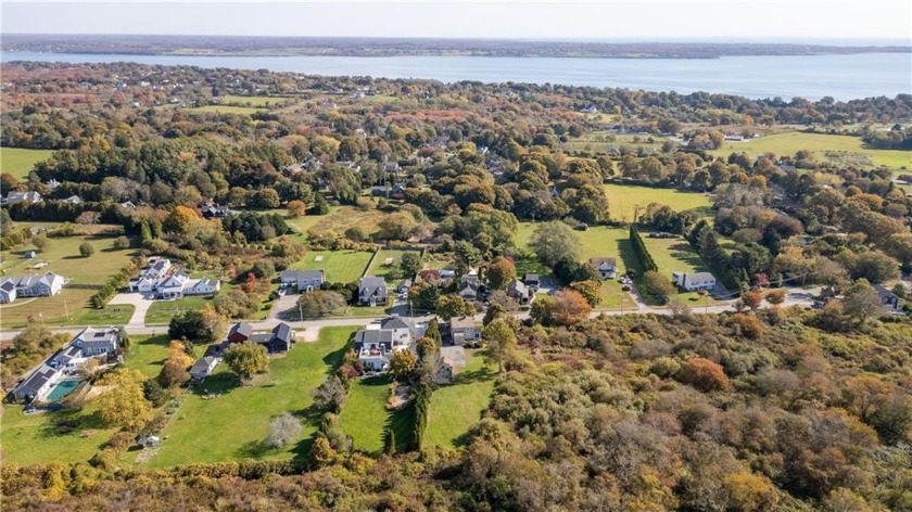 Sited on more than a half acre lot and abutting open space this - Beach Home for sale in Middletown, Rhode Island on Beachhouse.com