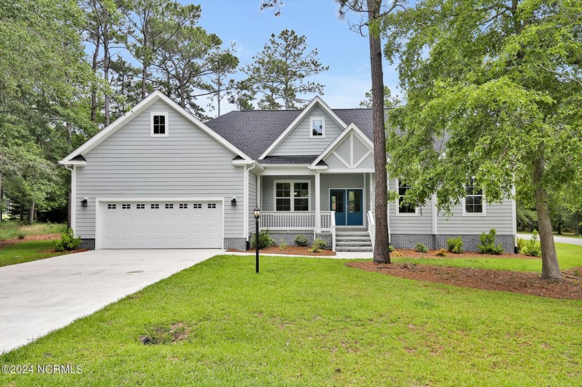 Welcome to your coastal haven, nestled among ancient oaks along - Beach Home for sale in Supply, North Carolina on Beachhouse.com