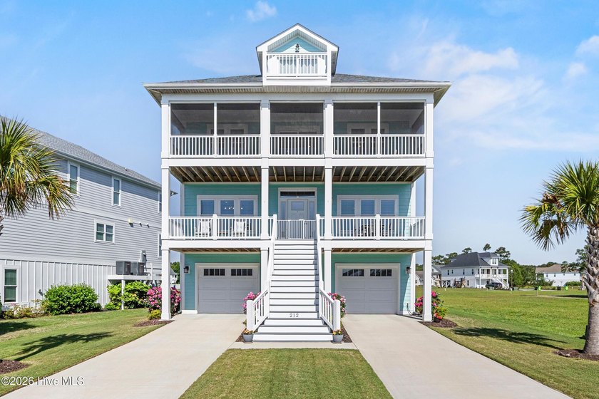 Perched along the Intracoastal Waterway, this exceptional - Beach Home for sale in Holly Ridge, North Carolina on Beachhouse.com