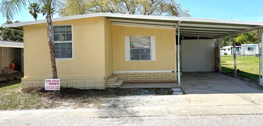 NO AGE RESTRICTIONS....3 BEDROOMS AND 2 FULL BATHS - Beach Home for sale in Largo, Florida on Beachhouse.com
