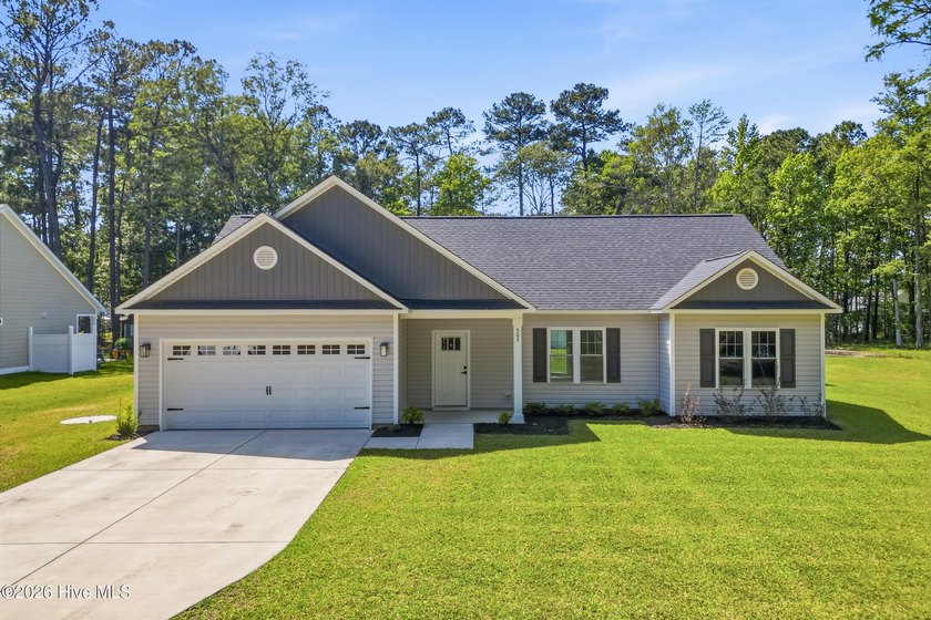 Welcome to 507 Leatherwood Dr NW, a like-new home nestled on - Beach Home for sale in Calabash, North Carolina on Beachhouse.com