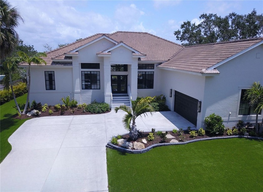 Welcome to your private waterfront retreat, where relaxed luxury - Beach Home for sale in Nokomis, Florida on Beachhouse.com