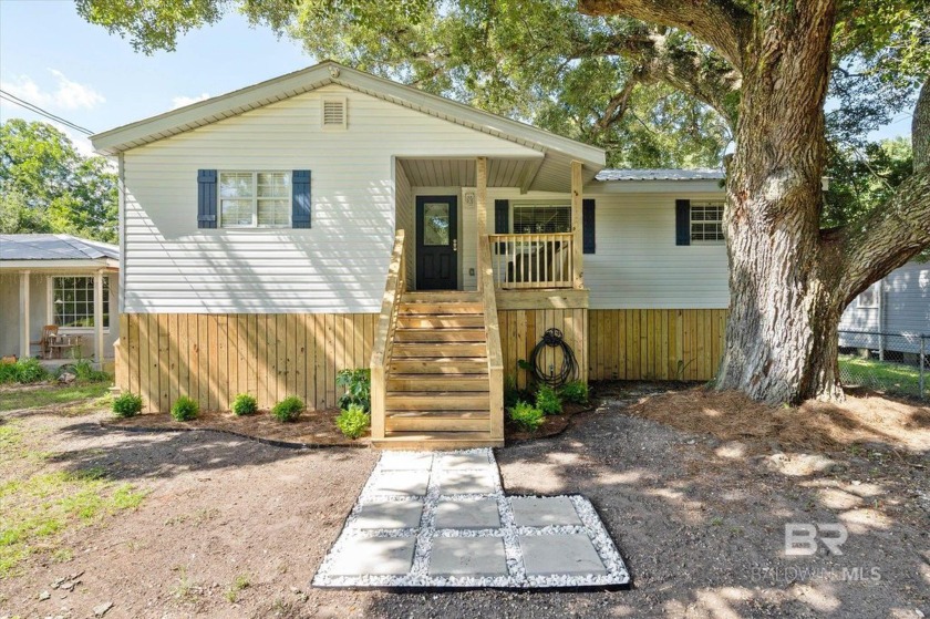 Don't miss this super cute and updated Island CottagDon't miss - Beach Home for sale in Dauphin Island, Alabama on Beachhouse.com