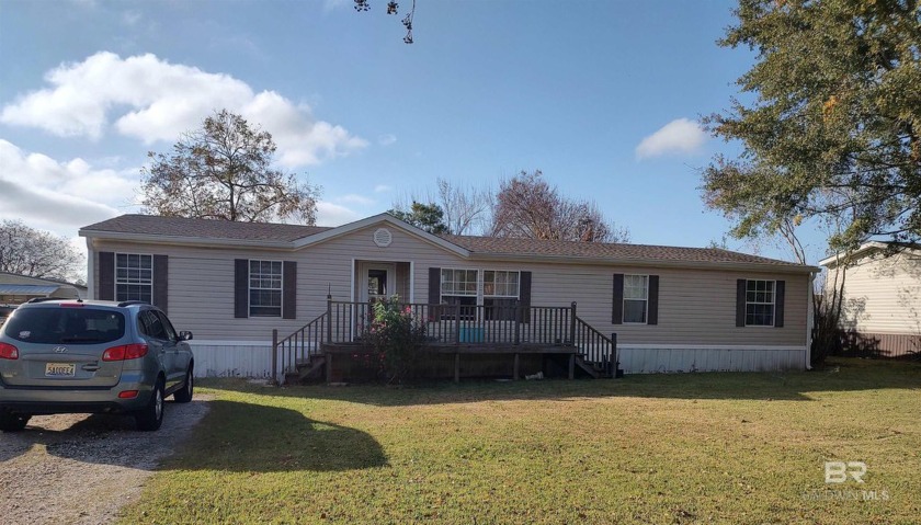 Discover this charming 4-bedroom, 2-bathroom mobile home located - Beach Home for sale in Fairhope, Alabama on Beachhouse.com