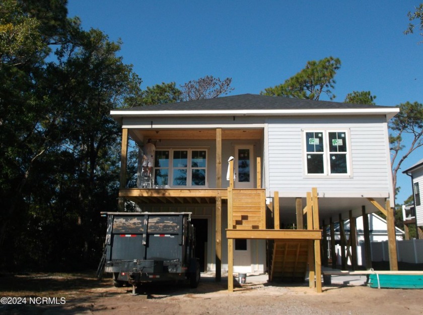 Don't miss the opportunity to see this charming beach house - Beach Home for sale in Oak Island, North Carolina on Beachhouse.com