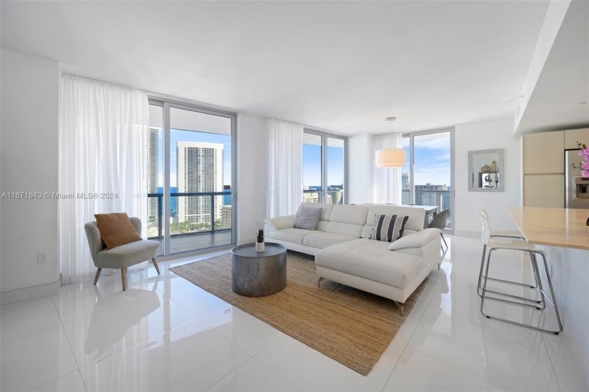 Experience luxury living at its finest in this stunning corner - Beach Condo for sale in Hallandale Beach, Florida on Beachhouse.com