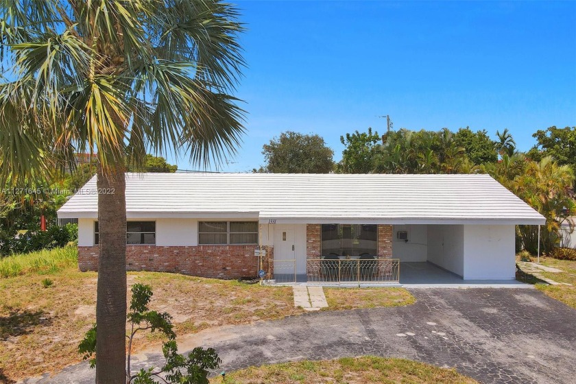 This 3BR / 2 BA corner lot home is spacious & has incredible - Beach Home for sale in Pompano  Beach, Florida on Beachhouse.com