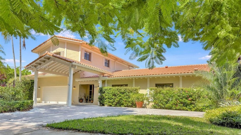 Welcome to this charming 5 bed/4 bath home nestled in the heart - Beach Home for sale in Key Biscayne, Florida on Beachhouse.com