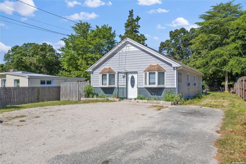 Picture this warm cozy 3-bedroom, 3-bathroom home as the - Beach Home for sale in Shirley, New York on Beachhouse.com