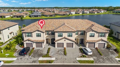 Experience resort-style living in this stunning lake view - Beach Townhome/Townhouse for sale in Fort Myers, Florida on Beachhouse.com