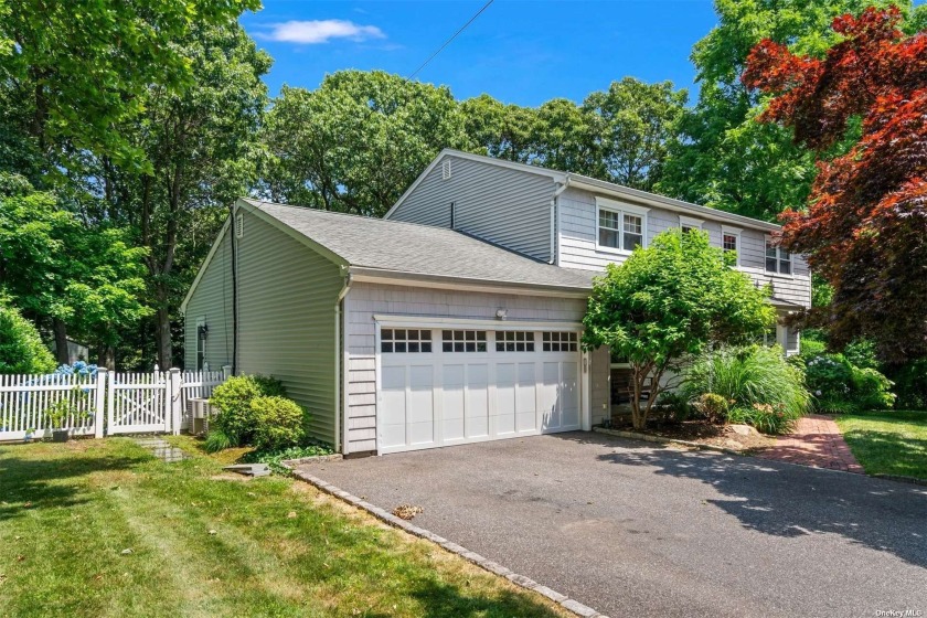 This Center Hall Colonial is the epitome of charm and - Beach Home for sale in Huntington, New York on Beachhouse.com