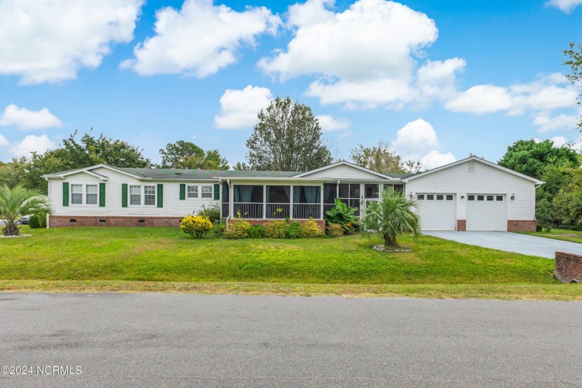 Don't miss this spacious, updated, 4 bedroom, 2 bath home with a - Beach Home for sale in Calabash, North Carolina on Beachhouse.com