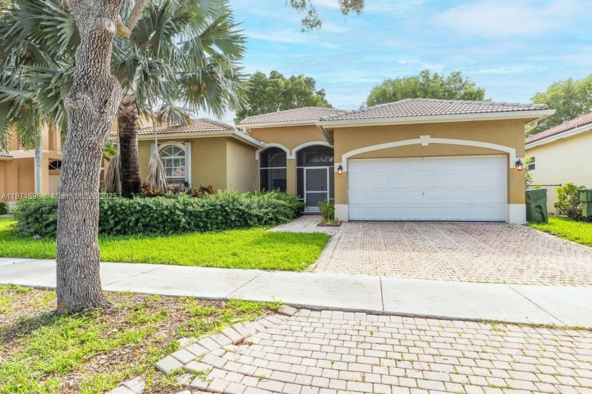 Spacious Lakefront 4/3 with a 2 Car Garage in Highly Sought - Beach Home for sale in Homestead, Florida on Beachhouse.com