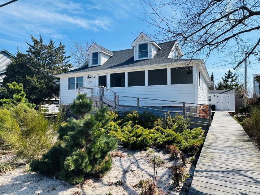 Water views of the Fire Island Inlet and Oak Island make this - Beach Home for sale in Oak Beach, New York on Beachhouse.com