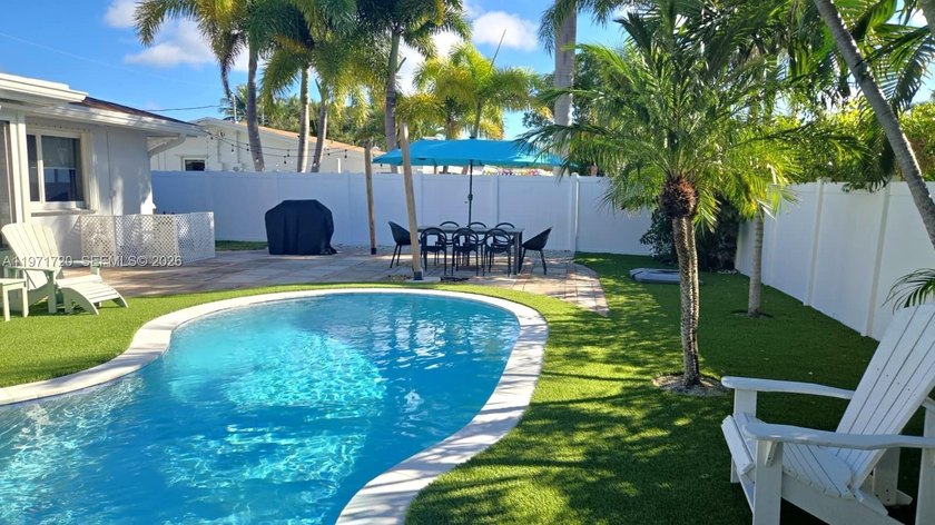 Driving down this tree-lined street, you'll instantly feel it: - Beach Home for sale in Lighthouse Point, Florida on Beachhouse.com