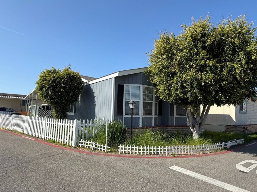 Welcome to your dream coastal retreat at 6301 Warner Ave #88 - Beach Home for sale in Huntington Beach, California on Beachhouse.com
