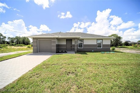 You Will Be Amazed By The Quality Of This Brand New Construction - Beach Home for sale in Lehigh Acres, Florida on Beachhouse.com