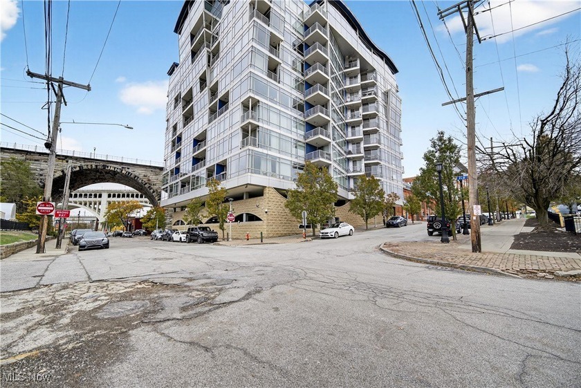 This Gem is located in the West Bank of the The Flats! This - Beach Condo for sale in Cleveland, Ohio on Beachhouse.com