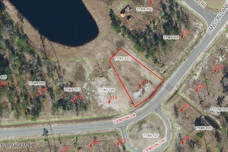 One of the last pond front lots in the neighborhood!  Don't miss - Beach Lot for sale in Sneads Ferry, North Carolina on Beachhouse.com