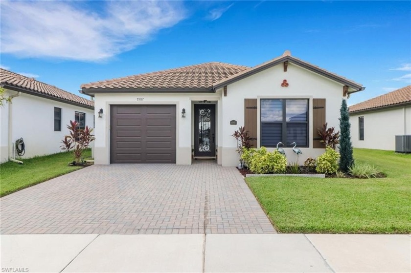 Welcome to this Huntington Floor plan built in 2022. Located in - Beach Home for sale in Ave Maria, Florida on Beachhouse.com