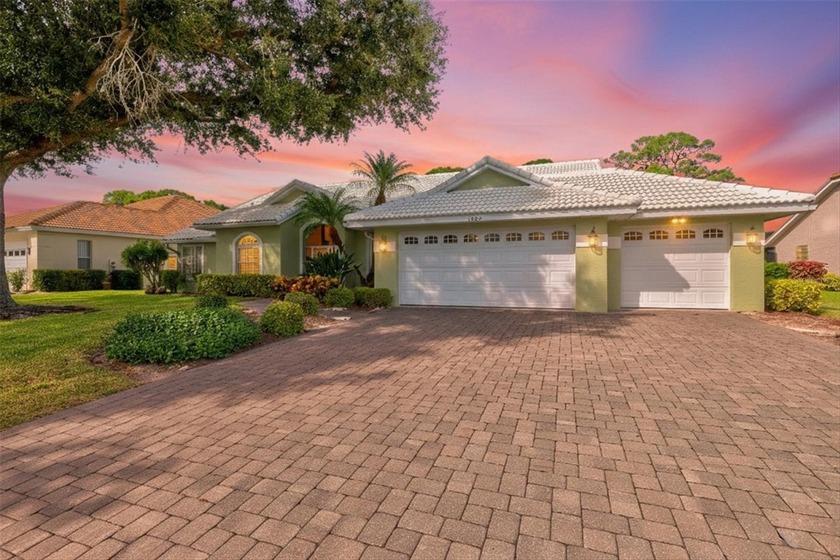 Located in the gated golf community of Calusa Lakes, this - Beach Home for sale in Nokomis, Florida on Beachhouse.com