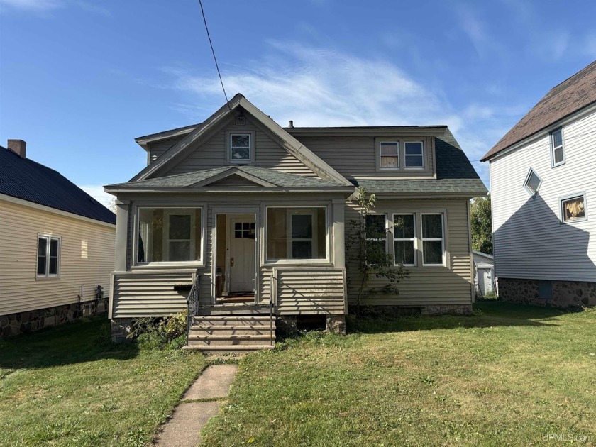 Great flipper or fixer upper opportunity priced to sell! This - Beach Home for sale in Ironwood, Michigan on Beachhouse.com