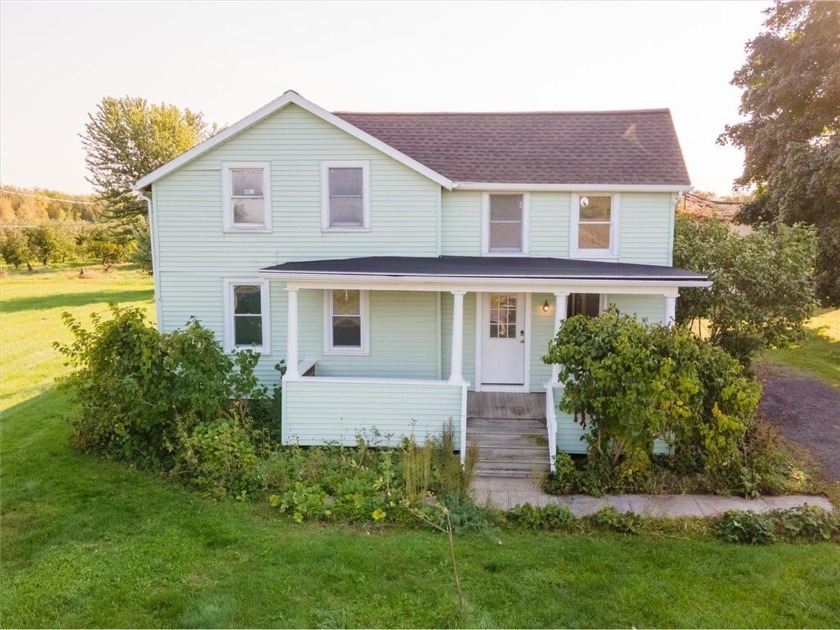 Step into this beautifully updated 4-bedroom, 2-bathroom - Beach Home for sale in Williamson, New York on Beachhouse.com