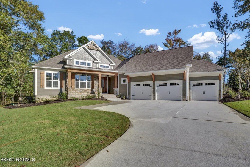 This exquisite custom-built home sits on a private, elevated lot - Beach Home for sale in Leland, North Carolina on Beachhouse.com