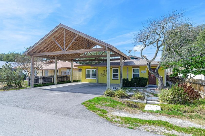 Welcome to this beautifully landscaped coastal retreat offering - Beach Home for sale in Fulton, Texas on Beachhouse.com