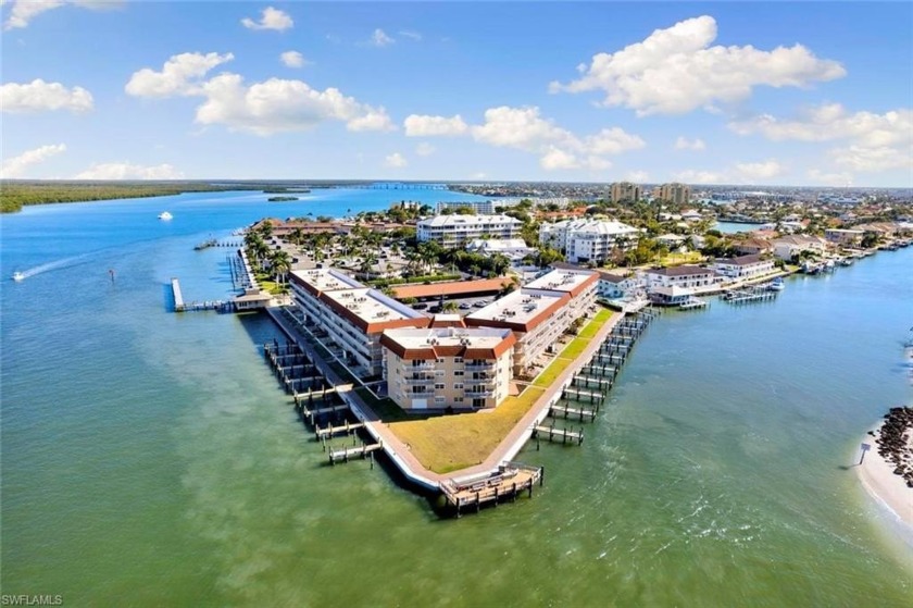 Experience the pinnacle of coastal sophistication with this - Beach Condo for sale in Marco Island, Florida on Beachhouse.com
