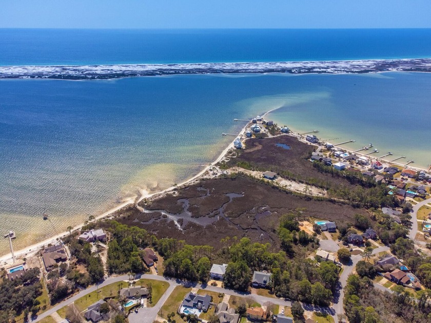 Build Your Dream Home with Stunning Water Views! This .29-acre - Beach Lot for sale in Mary Esther, Florida on Beachhouse.com