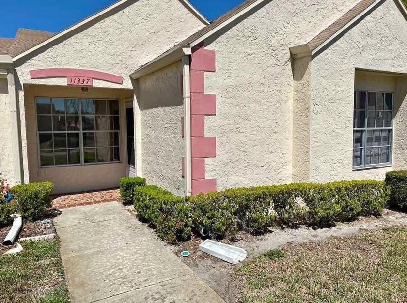 A quiet sense of ease defines this thoughtfully refreshed two - Beach Condo for sale in Port Richey, Florida on Beachhouse.com
