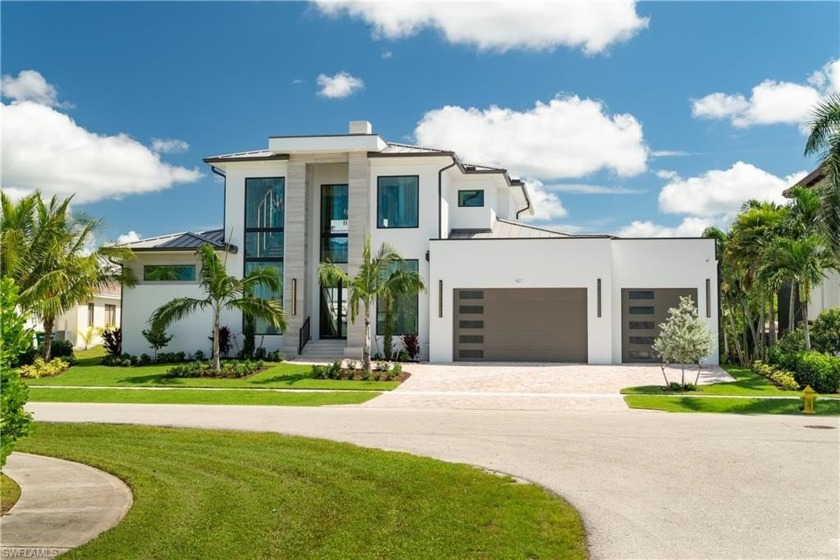 Welcome to 921 Giralda Ct -- a striking contemporary new - Beach Home for sale in Marco Island, Florida on Beachhouse.com