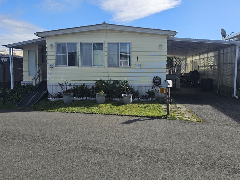 This inviting double-wide manufactured home, offering comfort - Beach Home for sale in Fortuna, California on Beachhouse.com