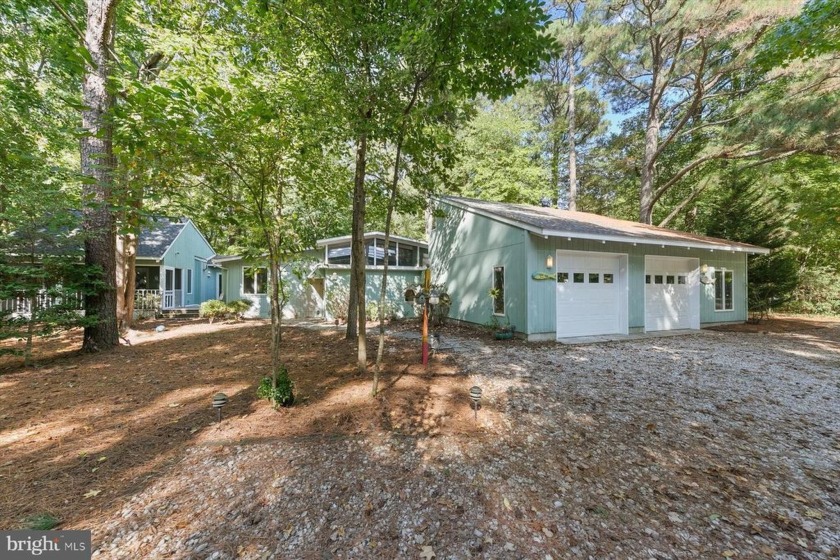 Impressive beach cottage located on a nearly half-acre wooded - Beach Home for sale in Bethany Beach, Delaware on Beachhouse.com