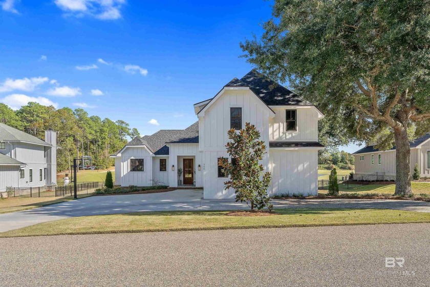 Watch the sunrise over the ninth green of the Robert Trent Jones - Beach Home for sale in Fairhope, Alabama on Beachhouse.com