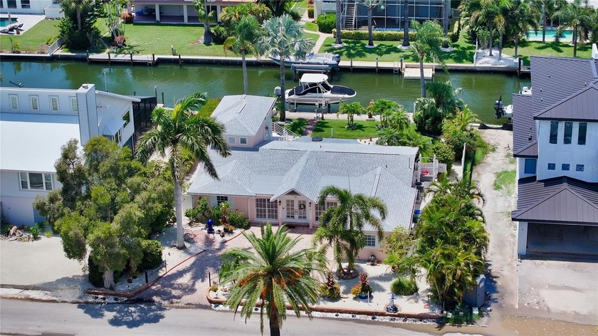 Welcome to Your Waterfront Paradise!  Discover this coastal - Beach Home for sale in Longboat Key, Florida on Beachhouse.com